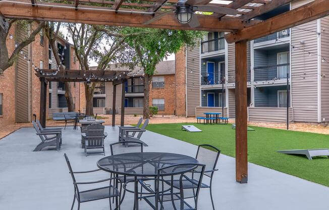 a couple of lawn chairs sitting on top of a building