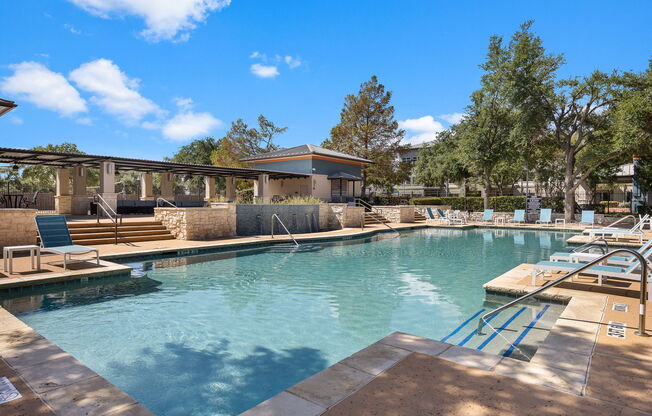 The Heated Salt-Water Pool Is Open Year-Round at Artisan Apartments & Shops, Austin, TX 78729