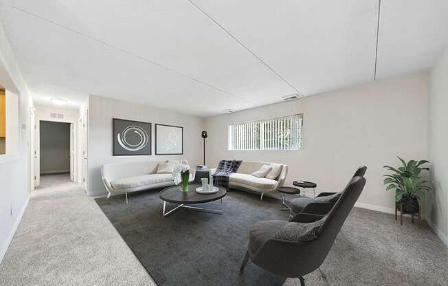 Model Living Room with Carpet and Hallway View at Heights Marlborough Apartments in Boston, MA.