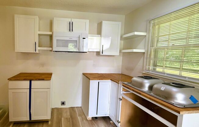 Newly renovated  3 bedroom 1 bath brick ranch home sitting on a large lot and on a quiet street in Gastonia