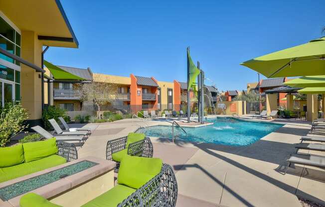 Sparkling resort-style pool and lounging area at Onnix Apartments in Tempe, AZ