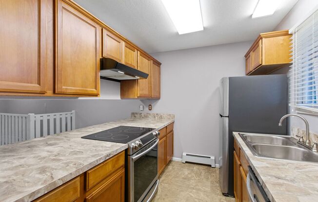 Charming 2-Bedroom Condo with Private Patio and Garage!