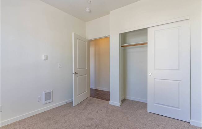 A room with a white door and a window at Riverplace Apartment Homes, Independence, 97351