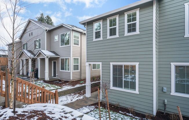 Super clean & spacious 4-bdrm/3-bath townhome in NE—Attached garage, great location