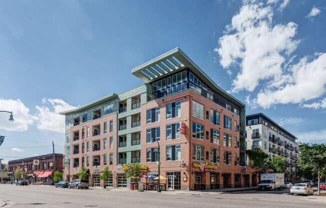 a large brick building on a city street
