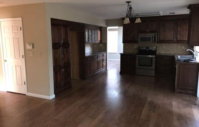 Ideal Salida Neighborhood! Upgraded laminate flooring throughout the first floor of the home. First floor has a guest bedroom and full guest bathroom with tile floors and a stall shower.!