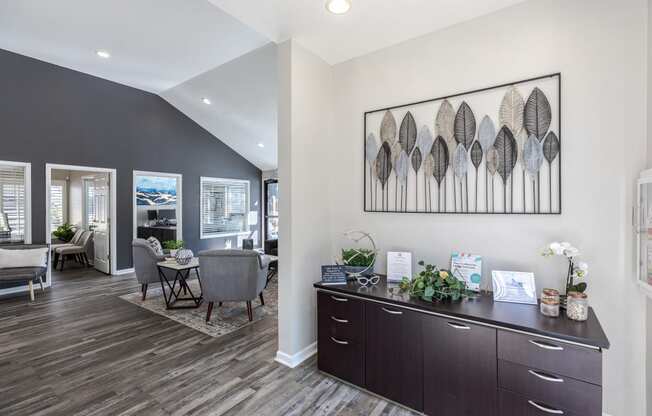 an open living room and dining room with a table and chairs