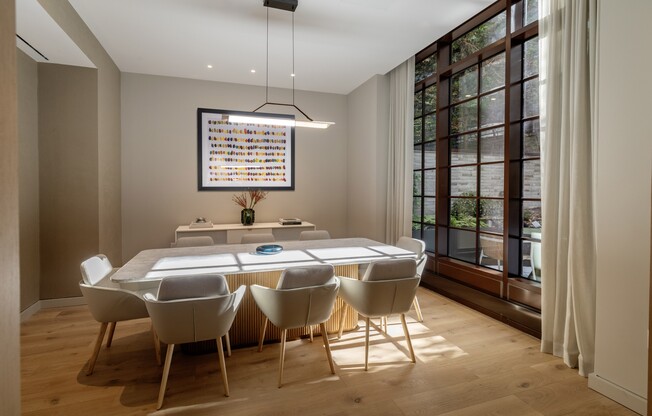 Elevate your lifestyle at Anagram Turtle Bay with this stunning dining area, featuring modern design and ample natural light. Perfect for gatherings or intimate dinners, it's a space that inspires. Schedule your private tour today!
