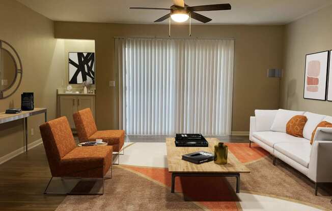 a living room with a white couch and a coffee table