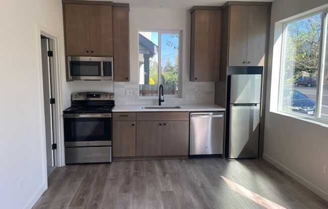 Delightful Modern Apartment in the Heart of Cully! Reach Out Today! Half Off Deposit & Waived Application Fee Upon Approval!