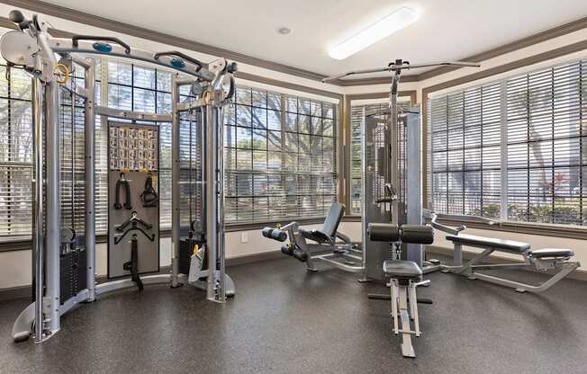 the gym at the enclave at woodbridge apartments in sugar land, tx