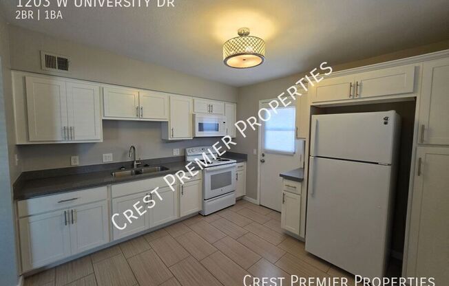 1203 W UNIVERSITY DR