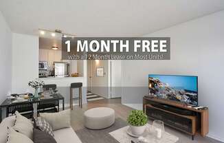 A living room with a flat screen TV on a wooden stand.