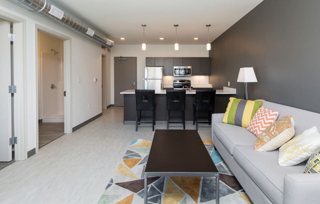 Spacious living room with neutral walls and ample natural light.