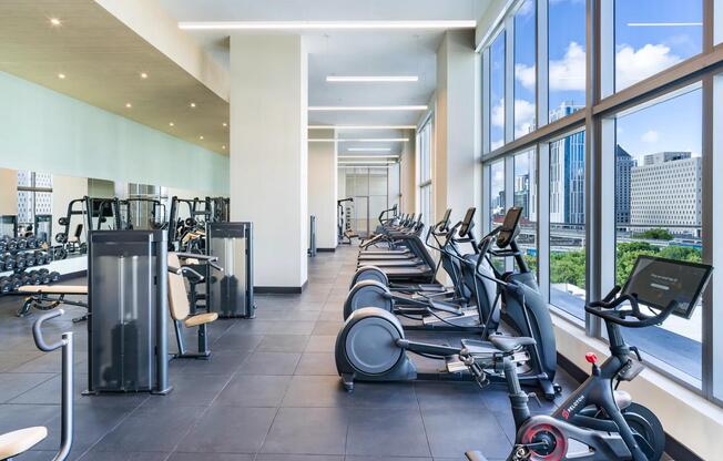 Stay active with cutting-edge equipment and downtown views at Modera Riverside’s light-filled fitness center.