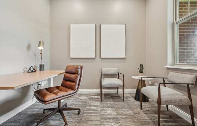 A room with a brown chair and a white table.
