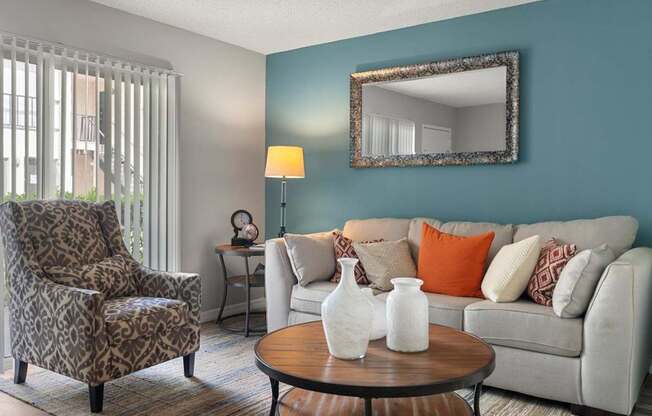 Model living room at Oasis at Bayside Apartments in Largo, FL