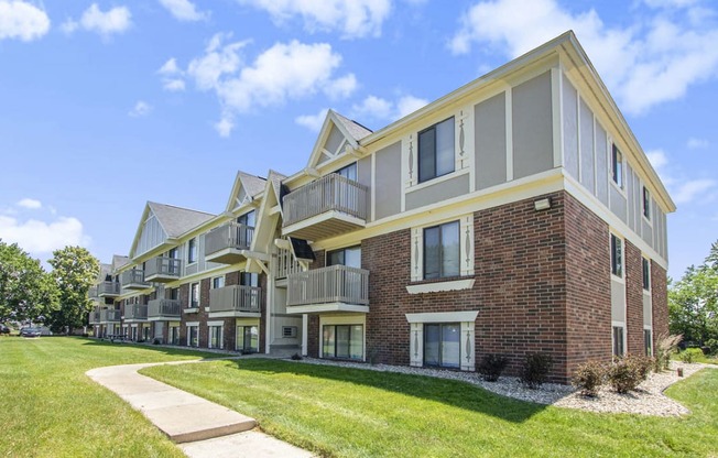 Attractive apartment building with green courtyard at Briarwood Apartments, Benton Harbor, Michigan