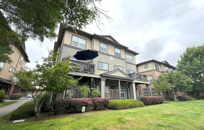 Charming 2-Bed Townhome in Sherwood with Pool Access, Garage, and Vaulted Ceilings!