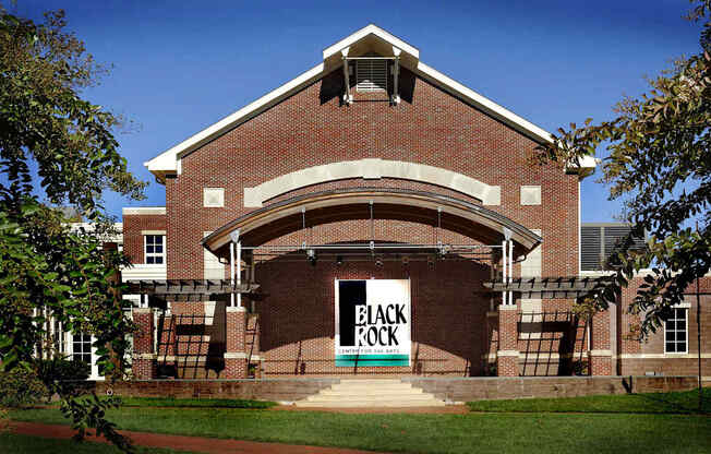 A brick building with a sign that says Black Rock.