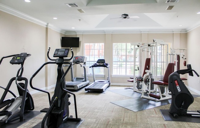 Montfort Place fitness center. Two treadmills, two cable machines, two cardio climber machines. one exercise bike. Montfort Place in North Dallas, TX, For Rent. Now leasing 1 and 2 bedroom apartments.