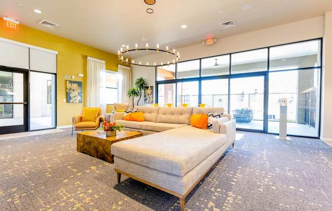 a large living room with a couch and a coffee table