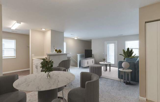 A living room with a grey sofa, a white table and a television.