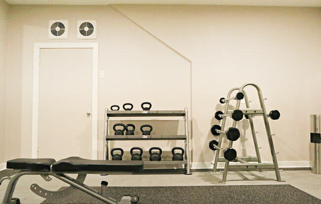 free weights at Fountain Pointe apartments
