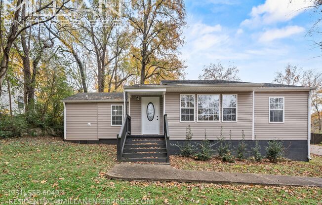 Charming Three Bedroom Home with Natural Privacy and Prime Location