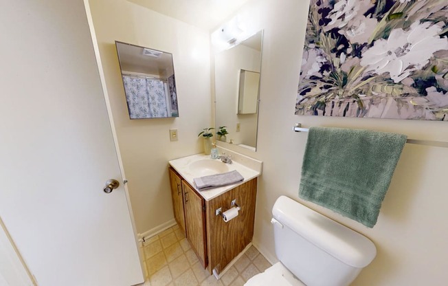 a bathroom with tiled flooring