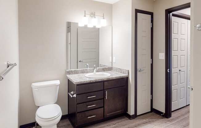 Renovated bathroom with linen storage closet at Northridge Heights Apartments