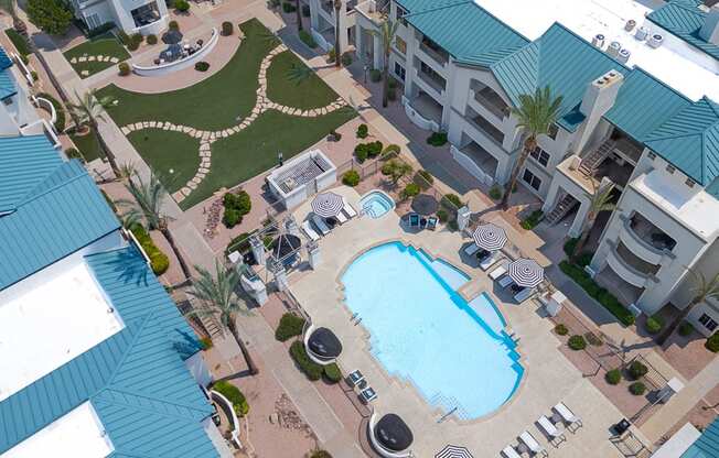 an aerial view of a swimming pool at the resort