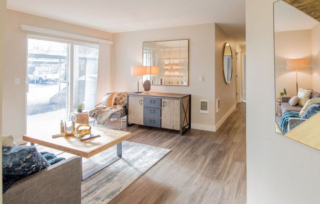 a living room with a couch and a table