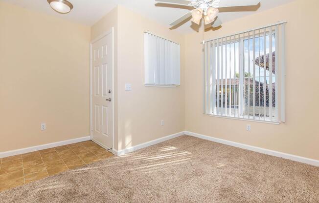 a bedroom with a large window