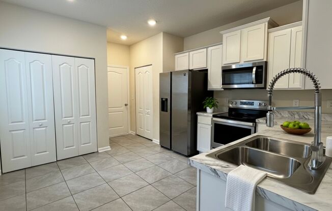3 Bed 2.5 Bath Bay Pointe Townhome Available Now! Attached Garage & Lawn Care Included!