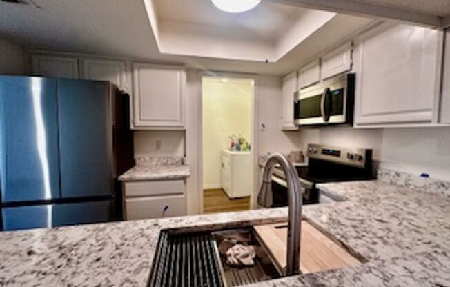 Renovated 2025 just steps away from community pool