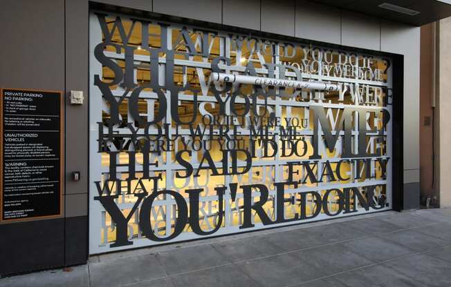 a mural on the side of a building with words on it