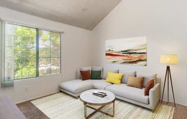 a living room with a couch and a coffee table