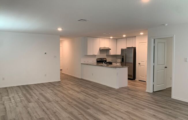 Luxury Vinyl Plank (No Carpet) / Fridge Included  /Granite Countertops Throughout / Instant Hot Water / CISD