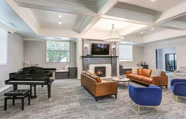 the heights club room with fireplace and piano at The Beckstead, South Jordan, UT