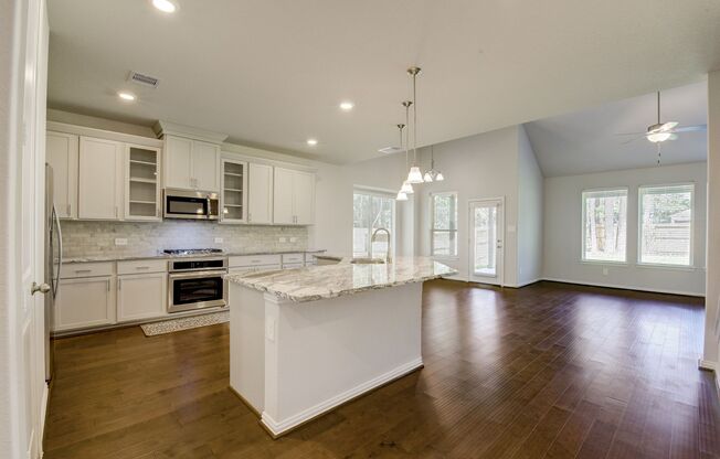 New construction 4 BD / 3.5 BR in The Woodland Hills!