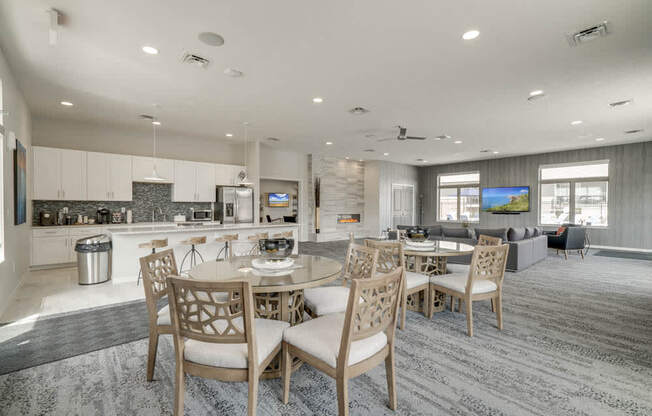 Clubhouse interior with kitchen and TV lounge for resident use at The Villas at Falling Waters townhomes in west Omaha NE