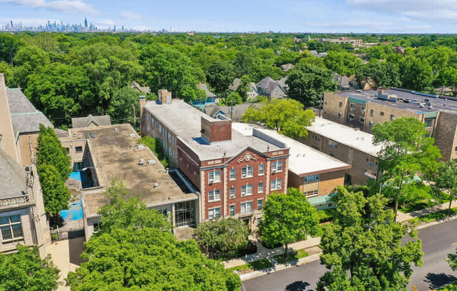A bird's eye view of a city with buildings and trees.