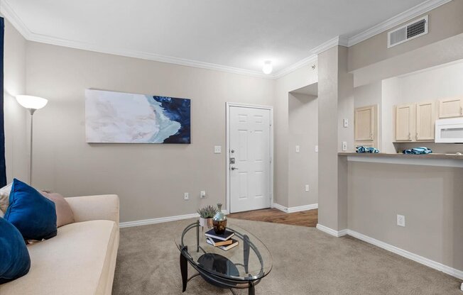 a living room with a couch and coffee table