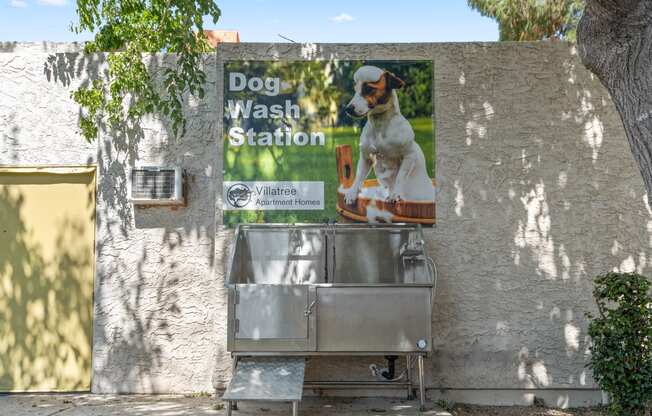 a sign for the dog wash station