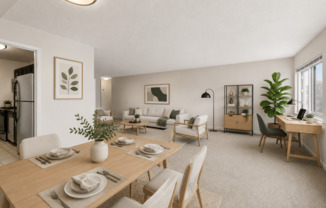 A dining room with a table set for a meal.