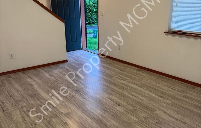 A nice house with 3 beds rooms and 1.5 baths.