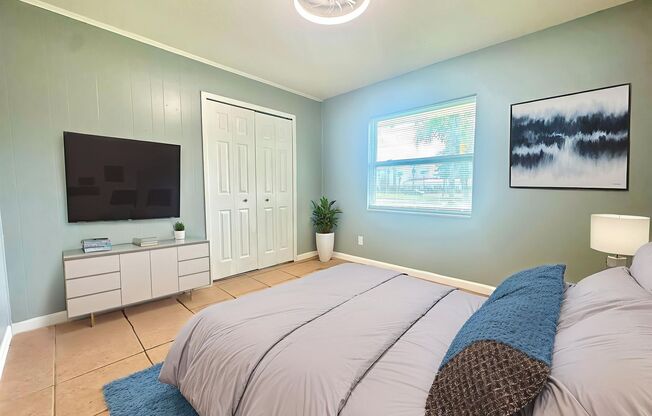 Feel right-at-home in this light-filled 2BR/1BTH with private yard!