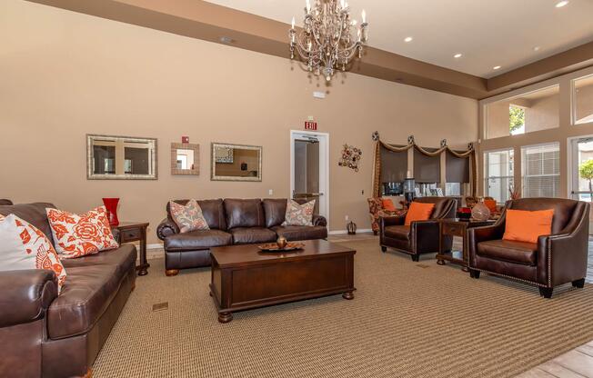 a living room filled with furniture and a flat screen tv