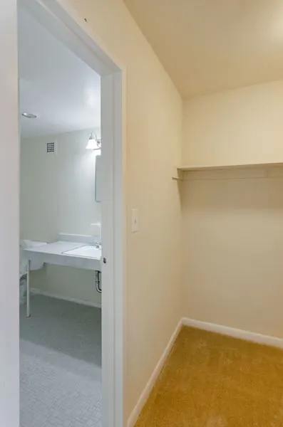 Studio Large Walk-In Closet and Bathroom with 4' Vanity